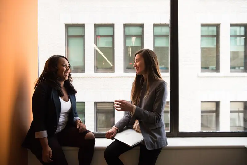 Female coworkers collaborating