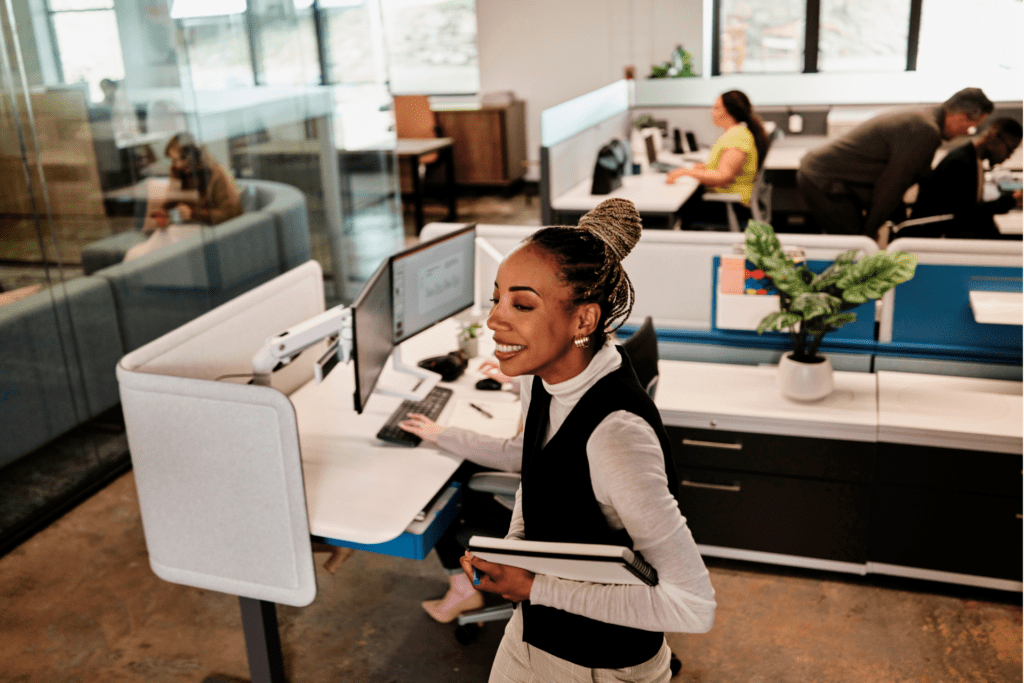 Worker walking through an office environment